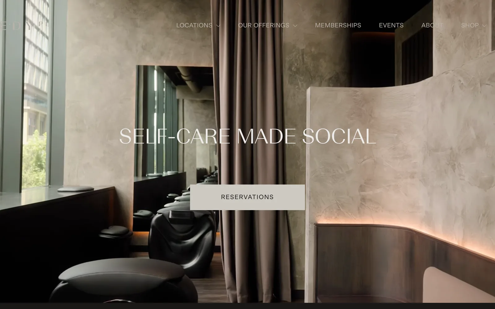 The Remedy Place homepage, a social self-care club interior under the line Self-Care Made Social.